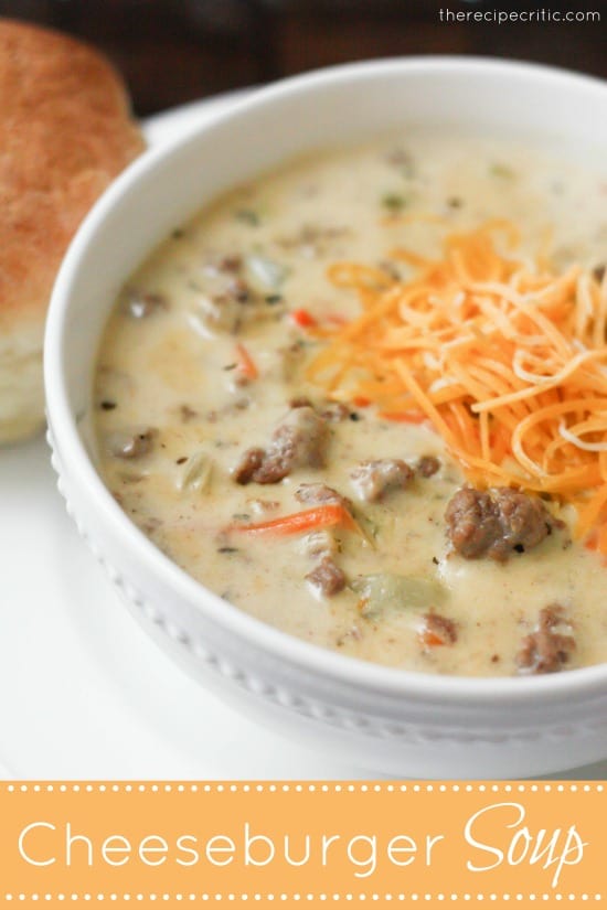 This hearty soup will fill you up and satisfy that burger craving! Hamburger-Soup in a white bowl.