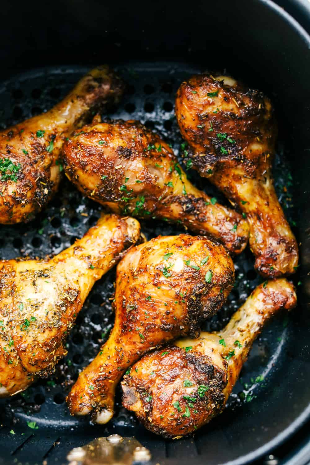 My kids always fight over who gets the chicken legs. With this Air Fryer Chicken Legs recipe, I can whip up a few batches and keep everyone happy! The bold flavor and crispy air-fried skin are totally unbeatable. Perfectly cooked chicken legs made in the air fryer.